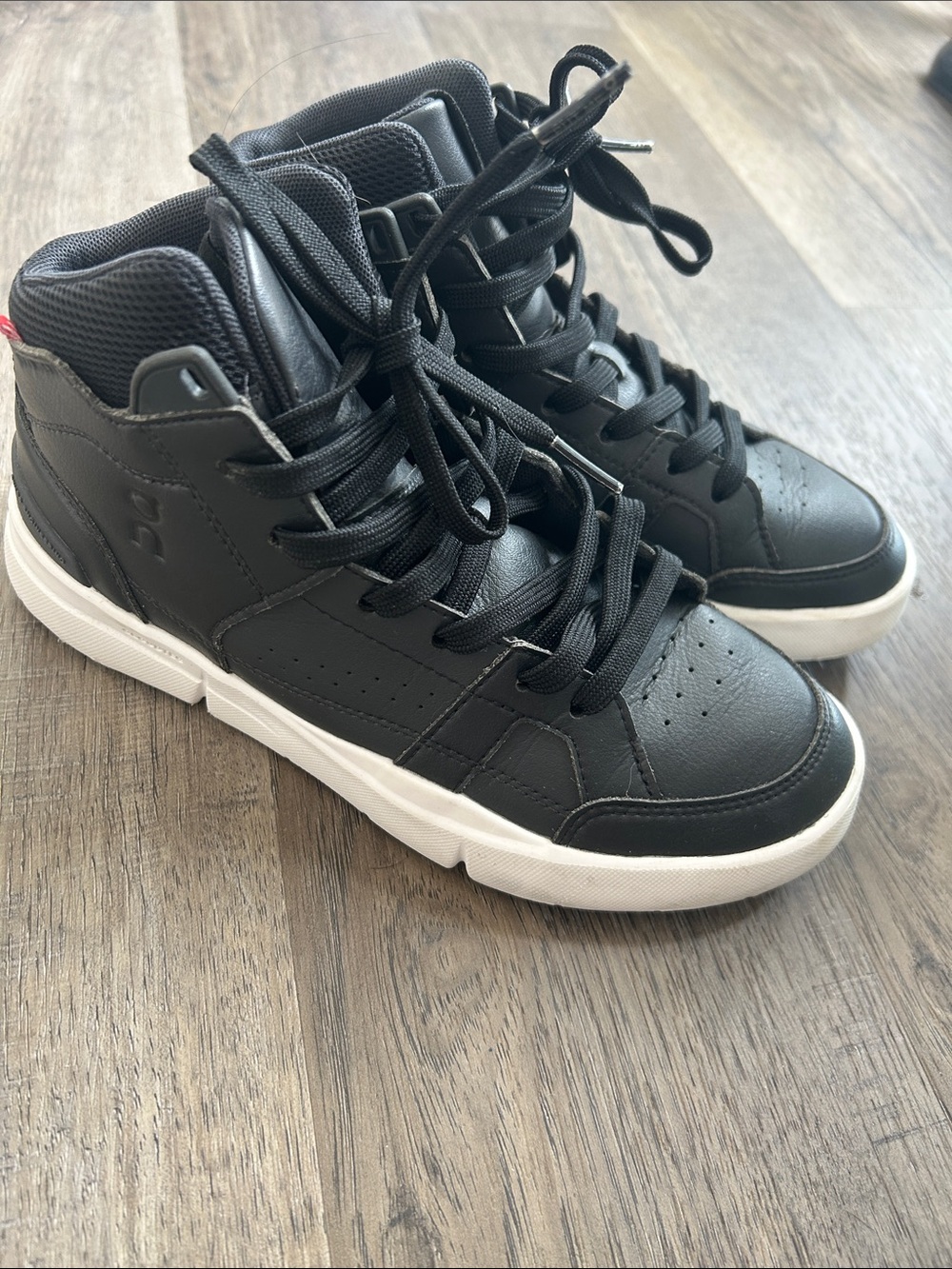 Uniqlo Black High-Top Sneakers with White Soles
